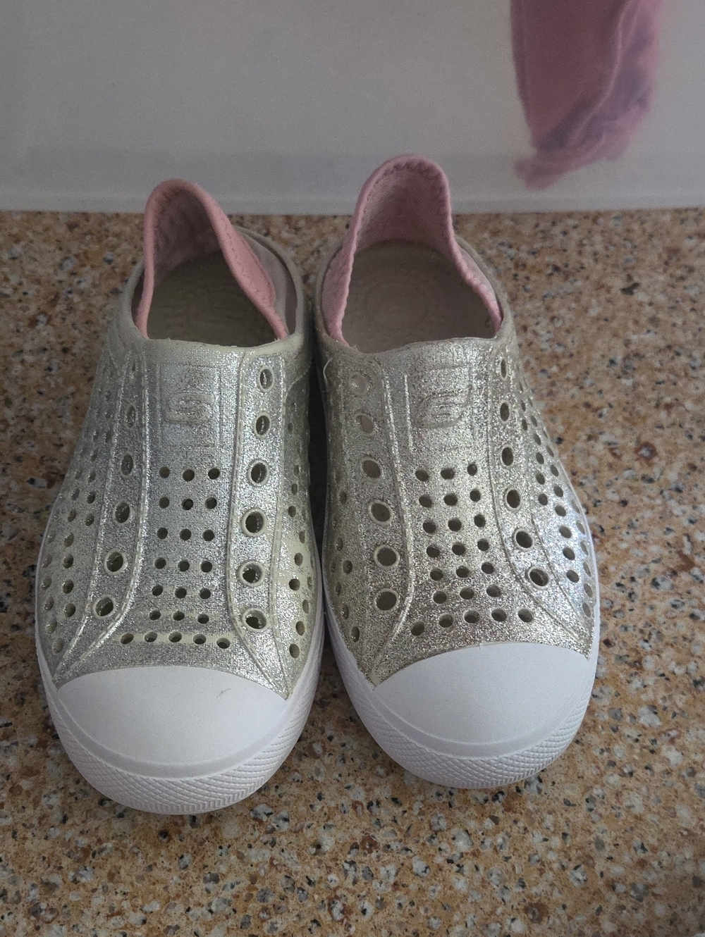 Skechers Kids Metallic Gold Slip-On Sneakers with Pink Lining